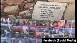 Bandera confeccionada con las fotos de los presos políticos cubanos fue desplegada en el frente de la antigua casa del padre del dictador.