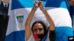 Activistas de Nicaragua protestan frente a la OEA en Washington, DC, el 23 de junio de 2021. (AP Photo/José Luis Magana, File).