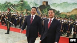 Los presidentes de México, Enrique Peña Nieto y de China, Xi Jinping, en Pekín.