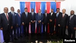 Louis Gerald Gilles, Frinel Joseph, Emmanuel Vertilaire, Laurent Saint-Cyr, Michel Patrick Boisvert, Jean Joseph Lebrun, Edgard Leblanc Fils, Regine Abraham, Fritz Alphonse Jean, Leslie Voltaire y Smith Augustin integran el Consejo de Transición de Haití, el 25 de abril de 2024. 