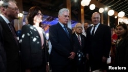 El gobernante cuba, Miguel Díaz-Canel, el ministro de Comercio Exterior e Inversiones de Cuba, Ricardo Cabrisas, y el viceprimer ministro de la Federación Rusa, Dmitry Chernyshenko. Cuba, 19 de mayo de 2023. REUTERS/ Alexandre Meneghini/Pool.