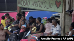 Migrantes en Darién, Panamá, en mayo del 2019. (Arnulfo Franco/AP).