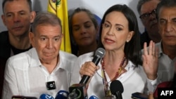 La líder opositora María Corina Machado y el candidato presidencial Edmundo González Urrutia / Foto: Federico PARRA (AFP)