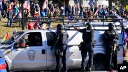 Una manifestación en apoyo al presidente Trump en Denver, Colorado, el 6 de enero de 2021. (AP Photo / David Zalubowski).