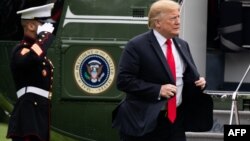 El presidente Donald Trump llega a la Casa Blanca en el Marine One.