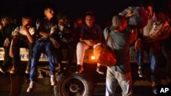 Migrantes en la caravana el sábado 12 de octubre. AP Photo/Isabel Mateos