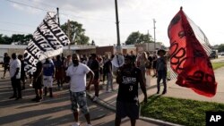 Manifestantes protestan contra el tiroteo a Jacob Blake. AP Photo/Morry Gash